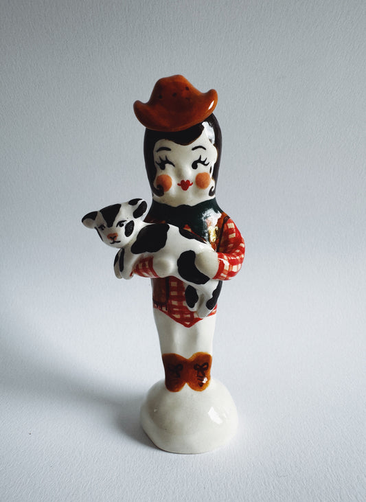 Cowgirl with Calf